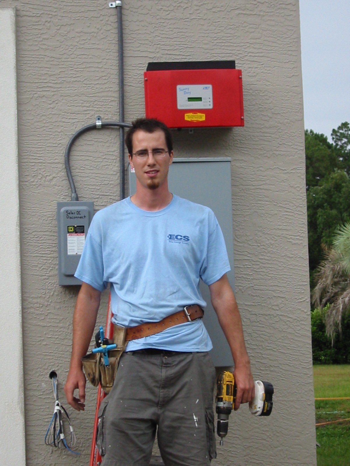 PVIP On the Job Photo of Solar Installation Worker with Tool Belt and Drill